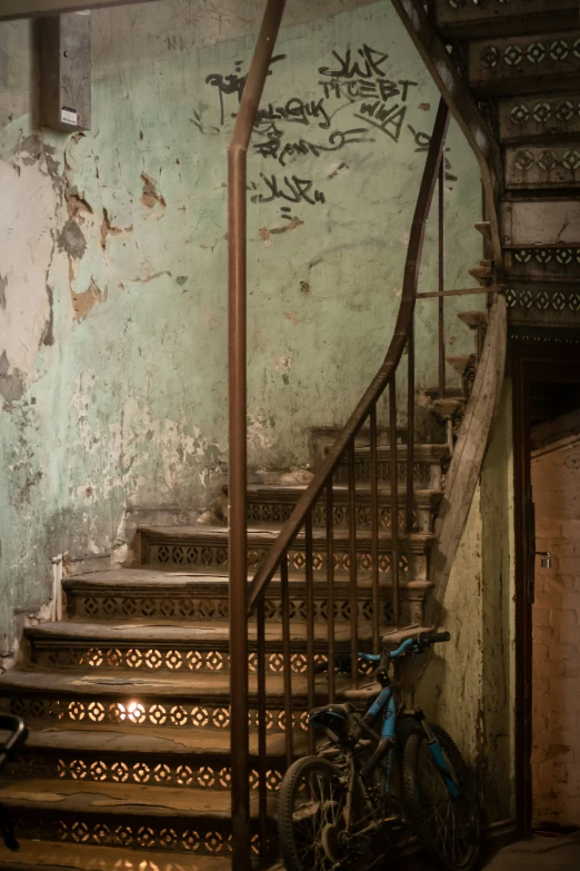 a bike is leaning against the handrails on some stairs