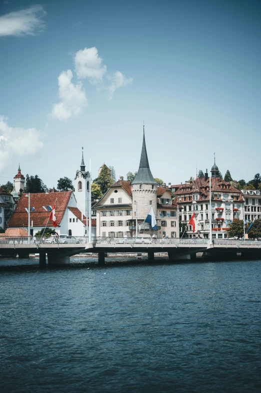 a river that is in front of a bridge