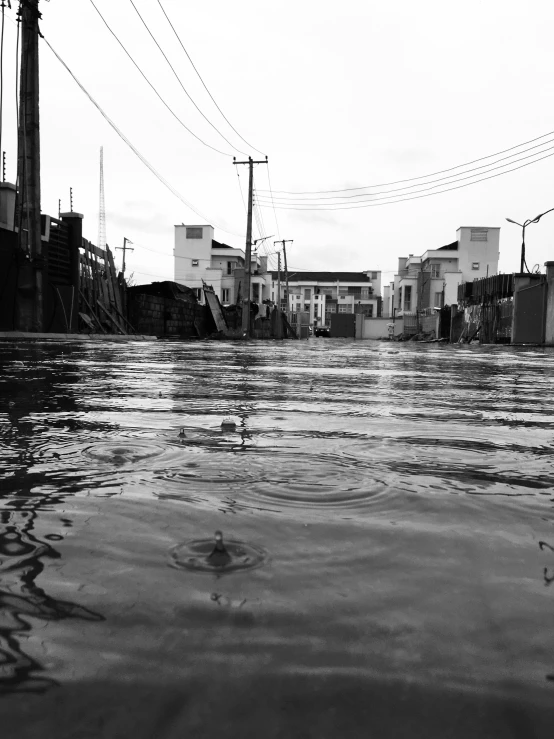 a river is running through a residential area