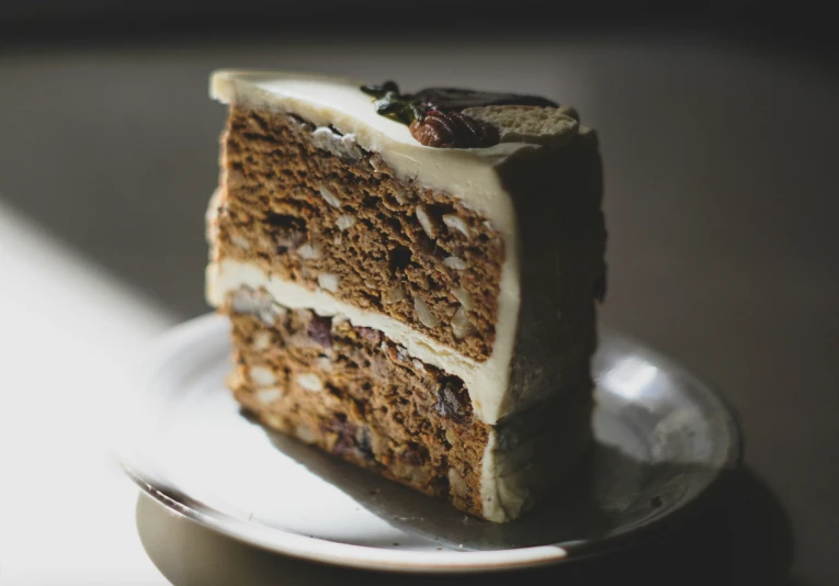 a piece of cake sitting on top of a white plate