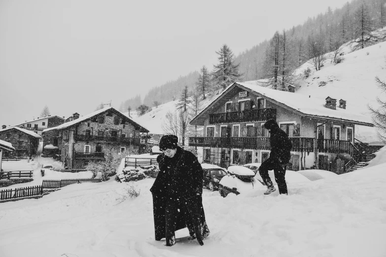 a black and white image of snow covered slopes