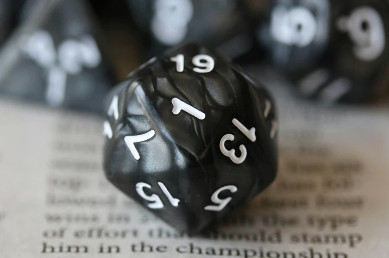 a close up of the black and white numbers on a dice