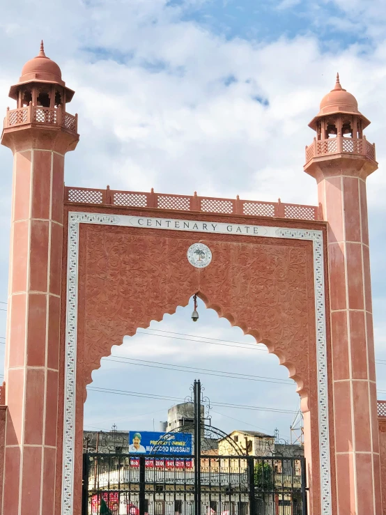 an archway in the center of a street