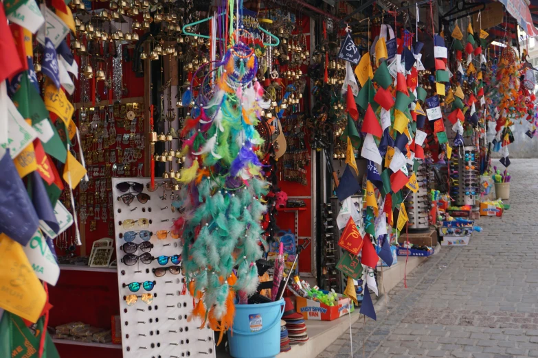 souvenir style christmas tree hanging near many other products