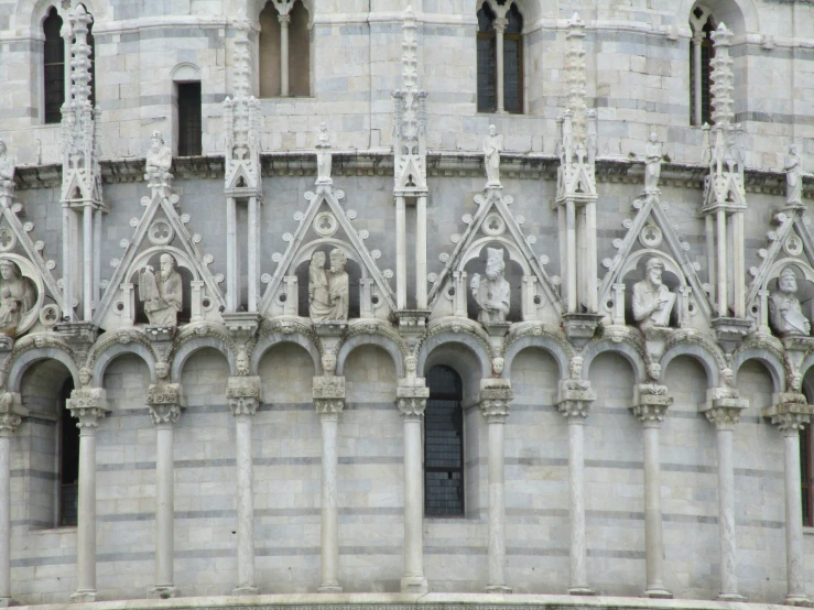 a gothic church has a clock at the center