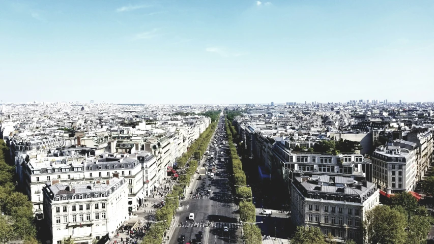 an aerial view of the city of paris, with old buildings