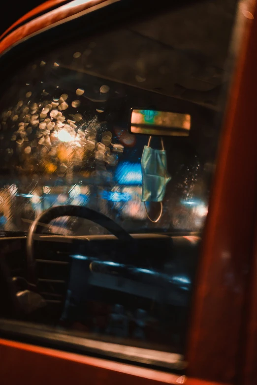 a picture of a dirty windshield of a car