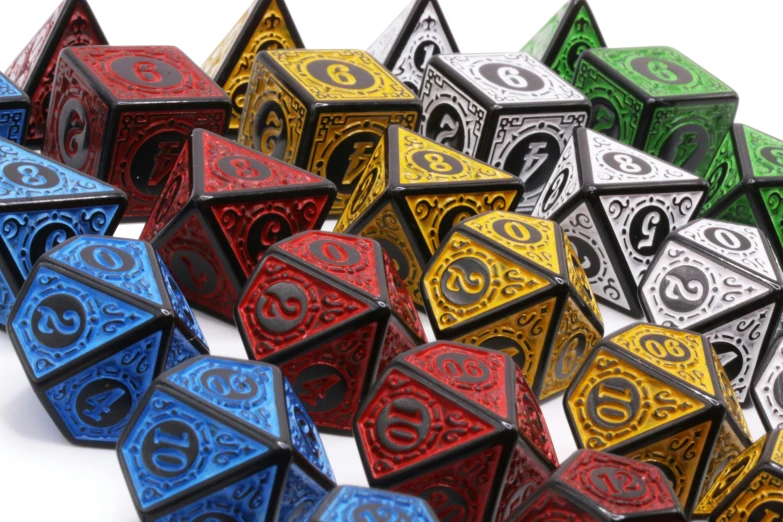 a set of seven colorful dice with numbers on them