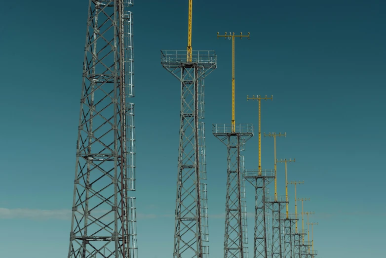 telephone tower array in the open clear blue sky