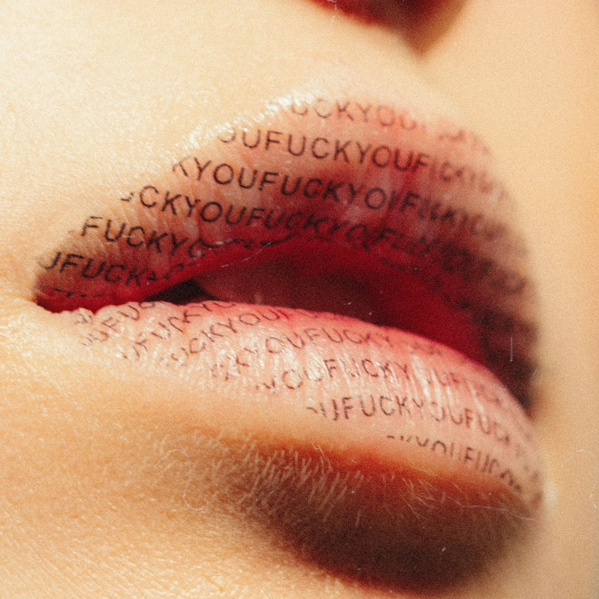 some type of graffiti written on someone's lipstick