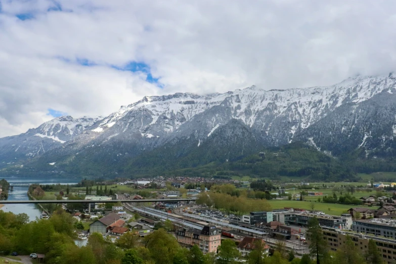 the mountains surrounding a city in the background