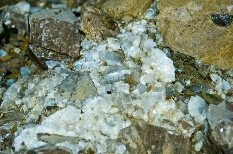 rock and mineral that contains white substance in it