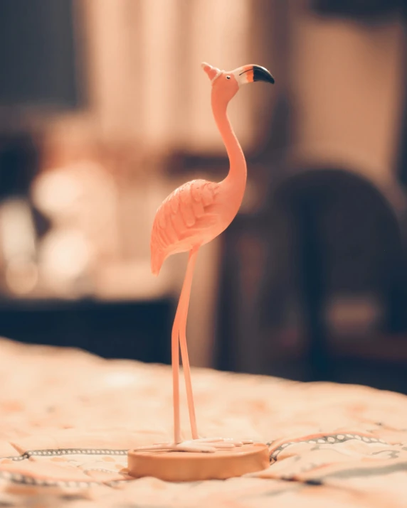 a toy bird on top of a table