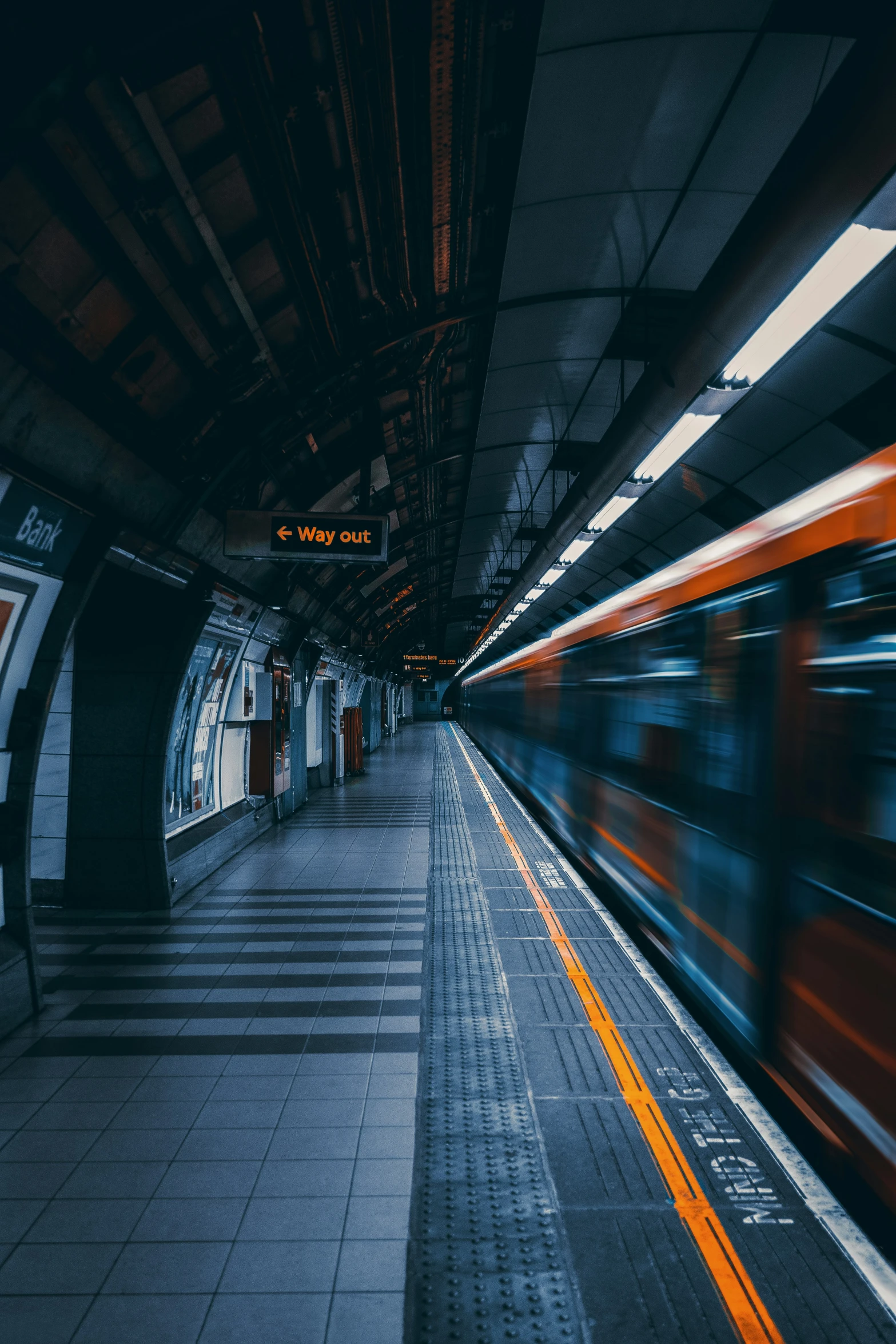 long exposure po of a subway station with motion blur