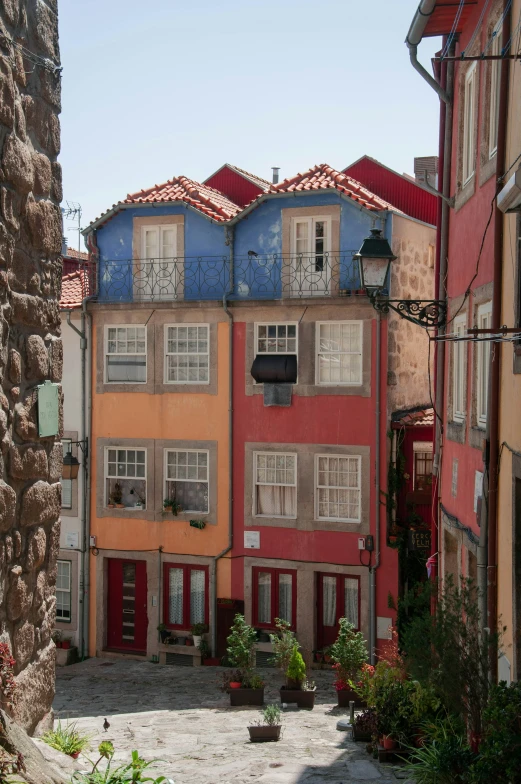 an old street with a house in it