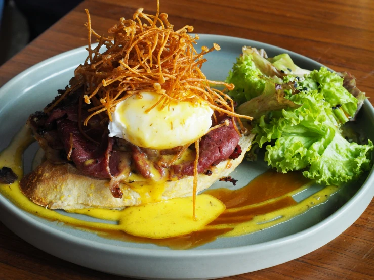 food served on a plate with a sauce drizzled over it