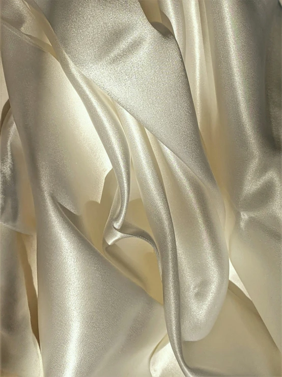 satin fabric made in cream color and white background