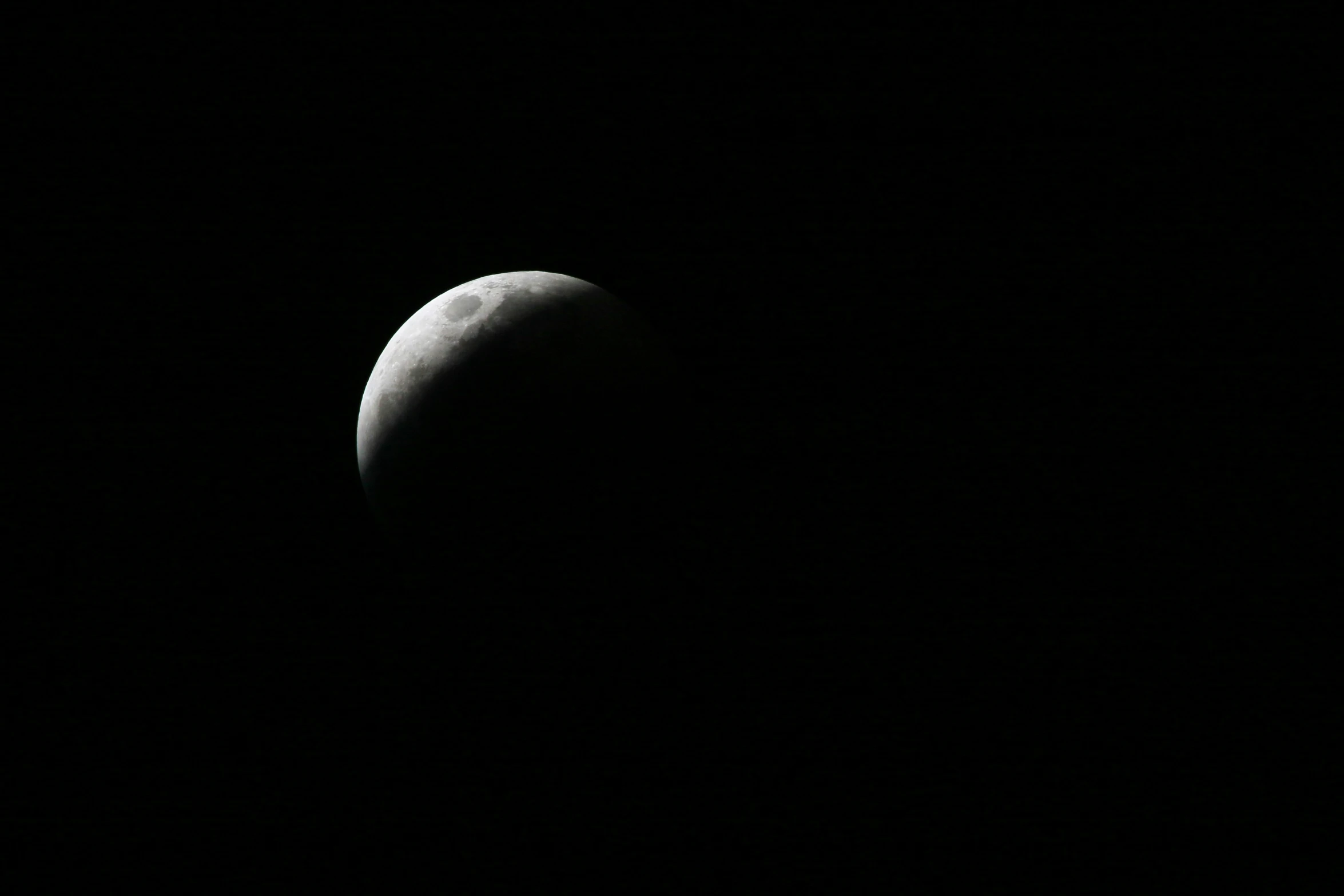 the partial view of the earth's moon during the eclipse