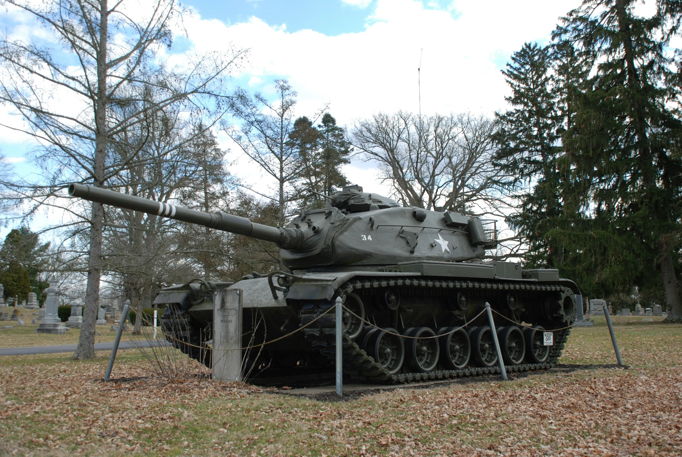 an old sherman tank on display in the grass
