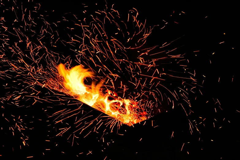 bright fire spewers coming out of the sky at night