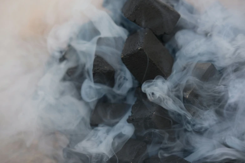 an ash - based smoke scene looks like the shape of cubes