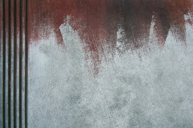 the background of an abstract painting of gray and red