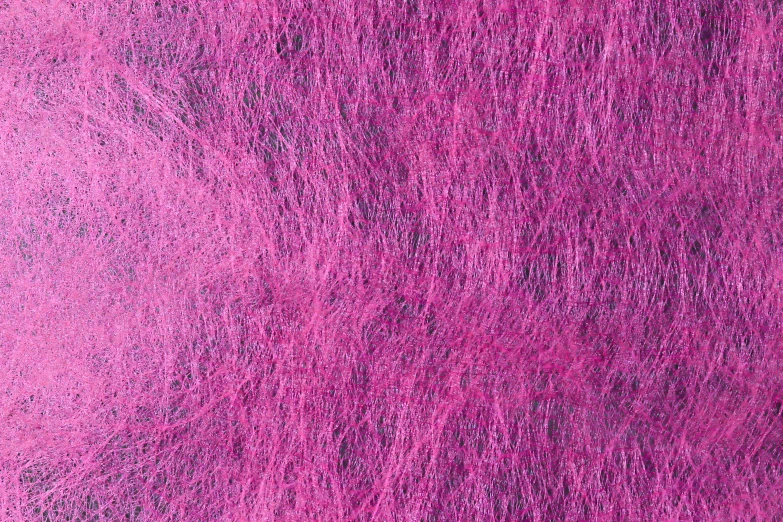 a purple textured surface with white spots