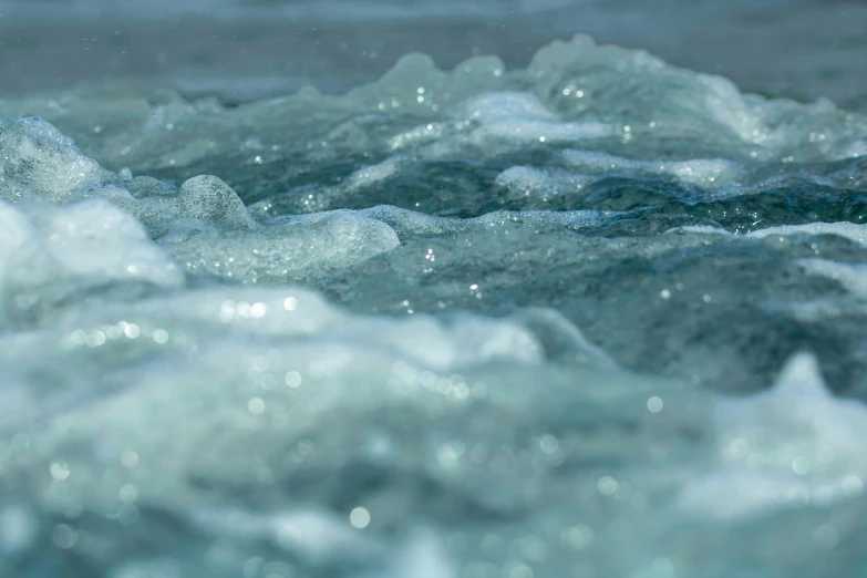 the waves are crashing and moving on the water