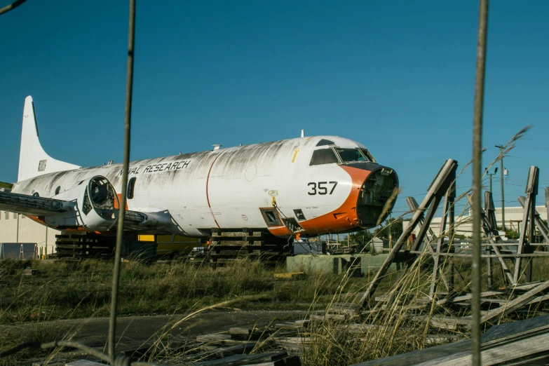 the large jetliner is parked on the land