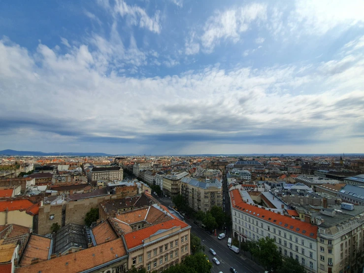 view of city and building roofs from top floor