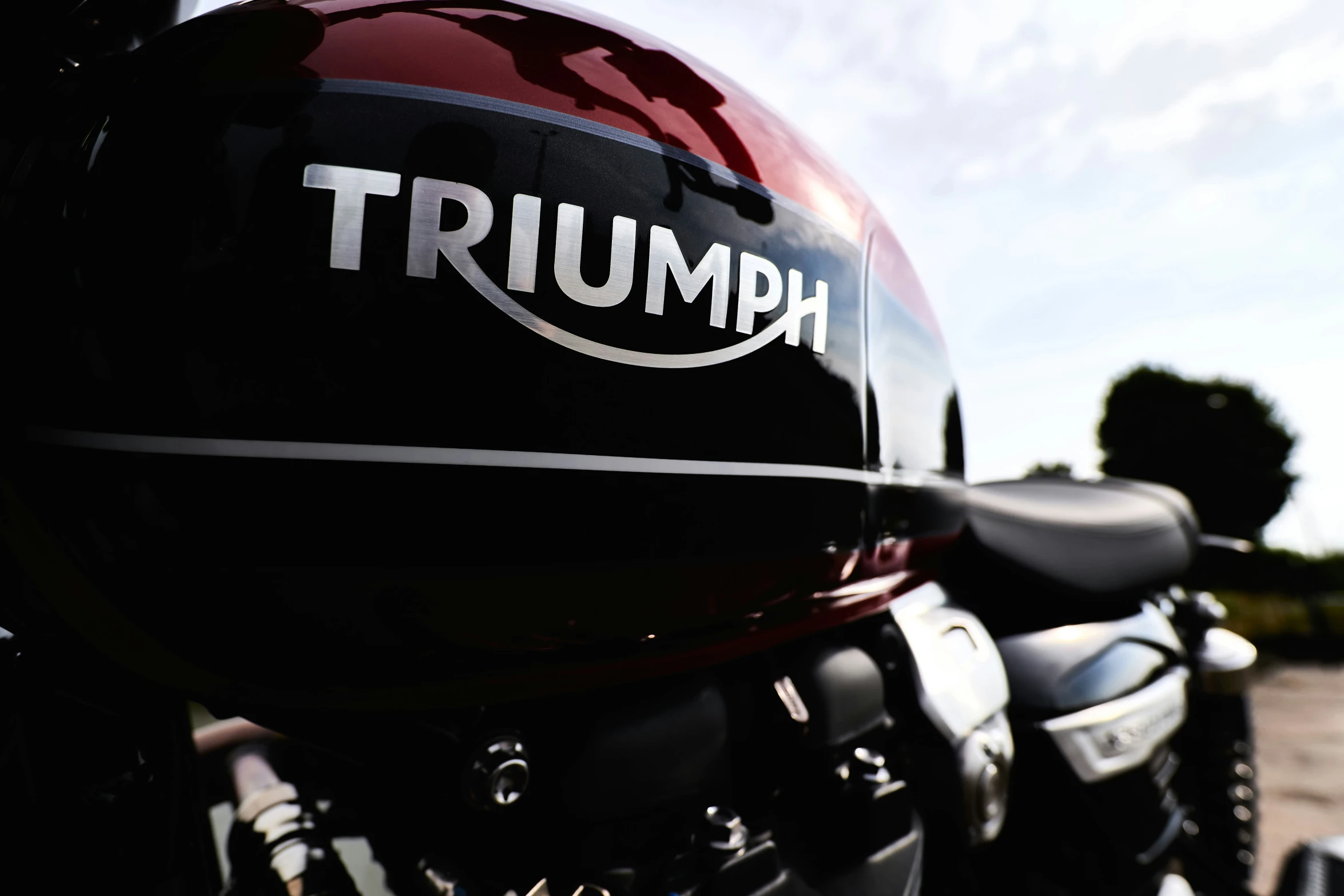 the triumph logo on the front fender of a sports motorcycle