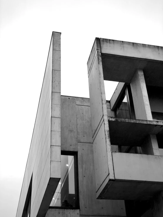 a tall building with a large concrete tower