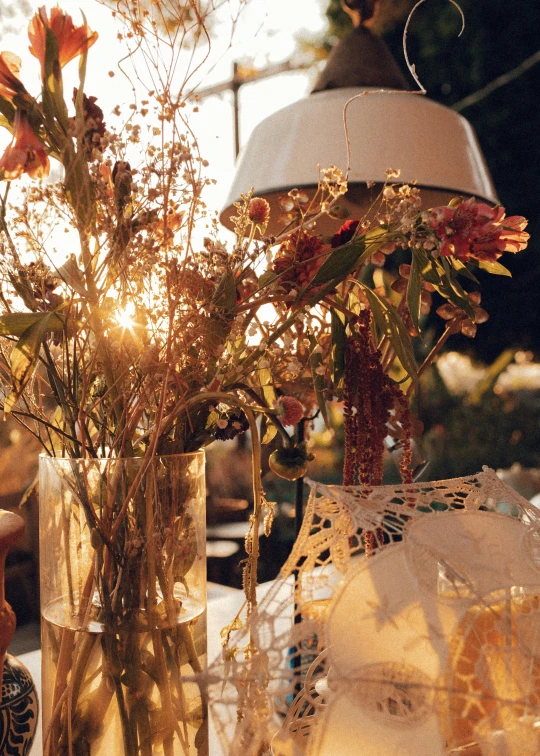 a close up of flowers in a vase on a table