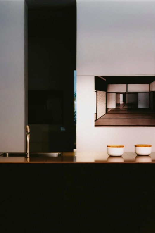 a view of a bathroom mirror with an interesting shape