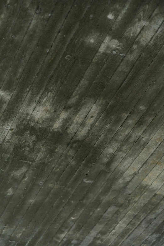 a man in black shirt skateboarding on cement