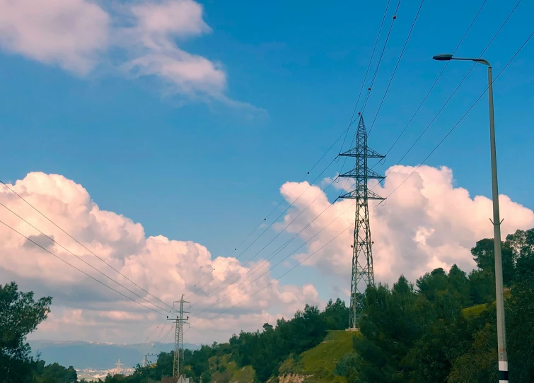 an overhead view of many power lines in the woods