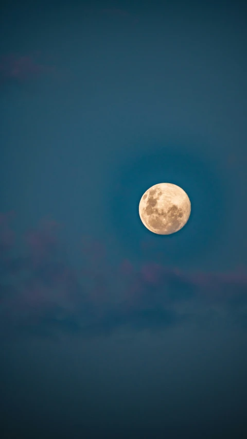 the moon is almost too dark in the sky