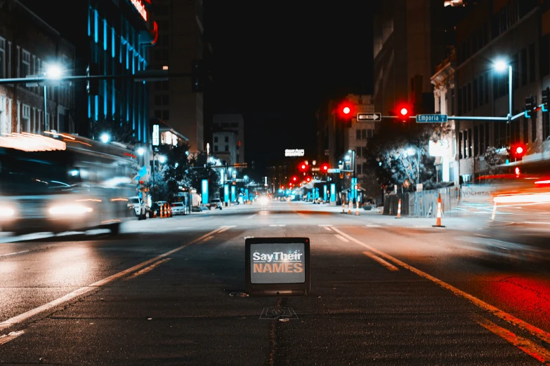 an electronic sign on the street says stop and go