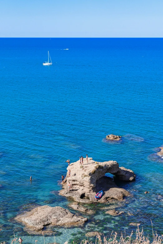 the water and boat are seen in the distance