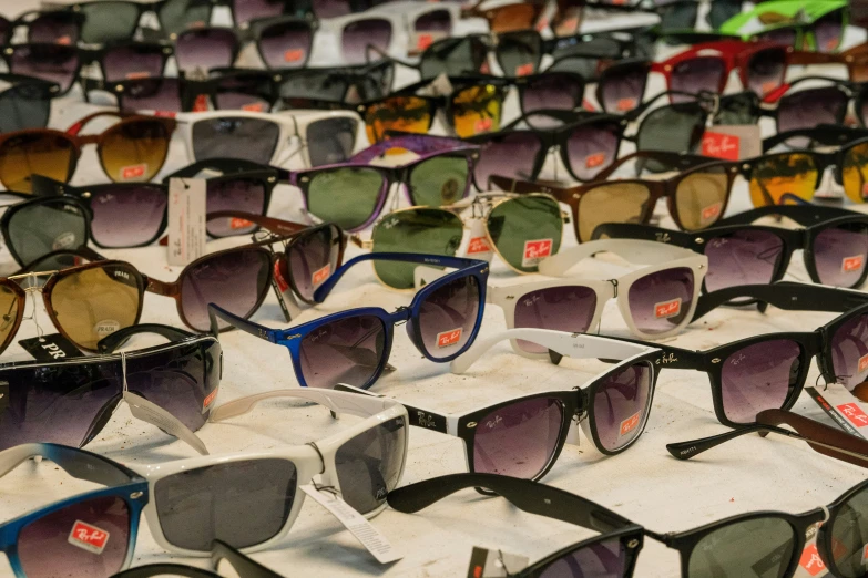 many different shades of sunglasses in the sun