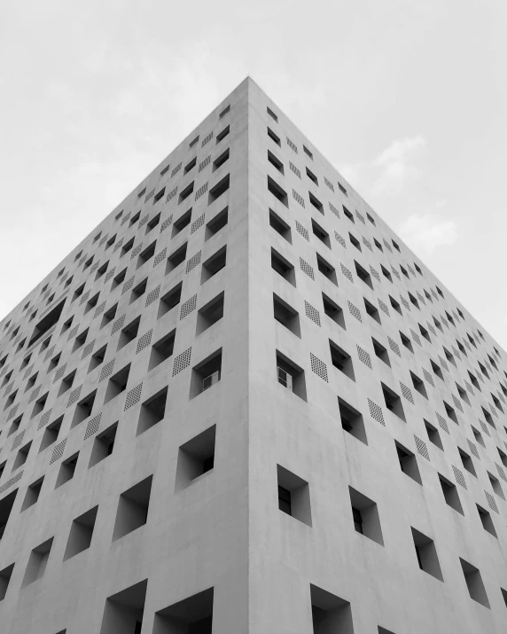 an architectural view of the side of an apartment building