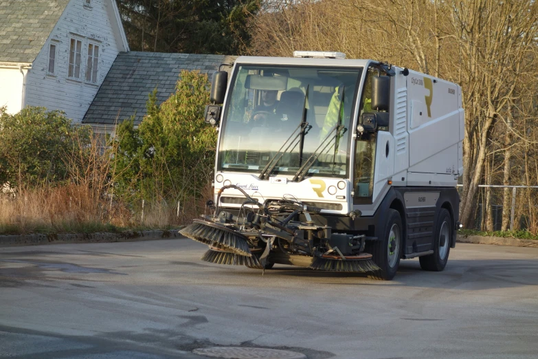 a truck that has some buckets on the front