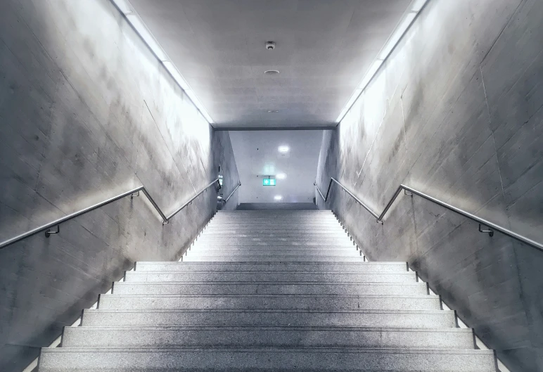 stairs leading to the exit at a subway station