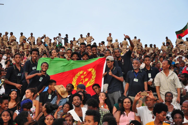 a group of people are in the audience