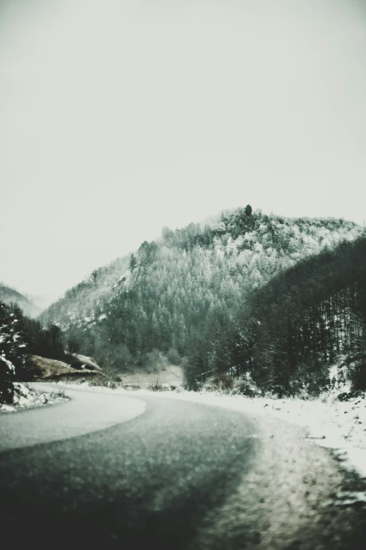 a scenic s of snow covered mountains