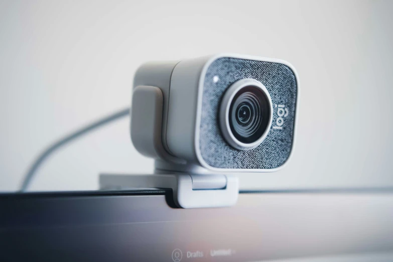 the small webcam is attached to a wire