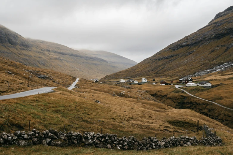 a scenic view of the valley and road