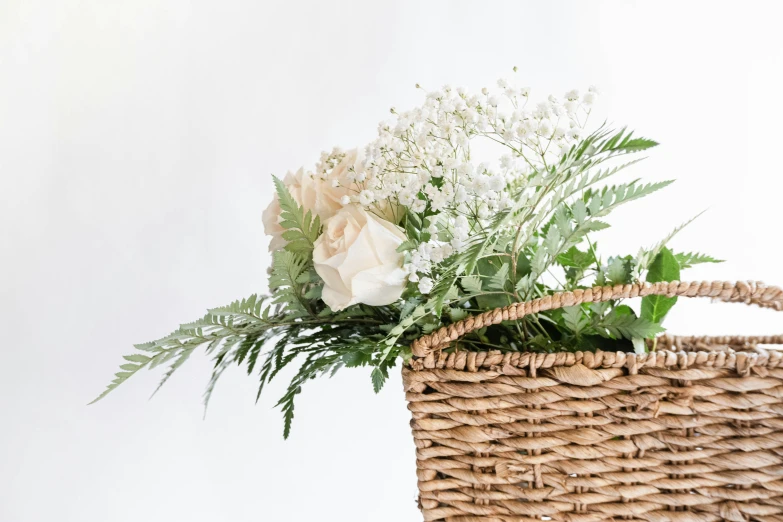 the flowers are in the basket and ready to be put into it