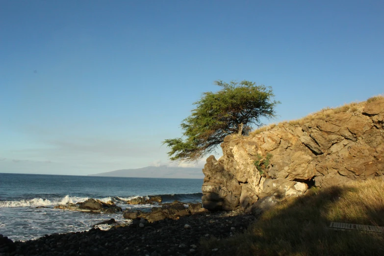 this is the view from the cliff overlooking a body of water