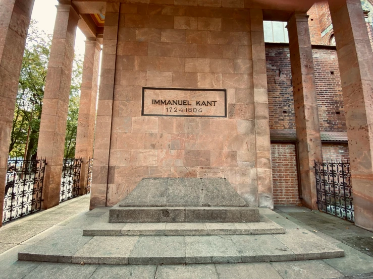 two steps with a memorial plaque below them